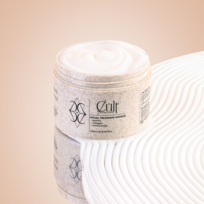CULT Haircare Ritual Treatment Masque 250ml open jar on a rippled white surface with creamy texture and soft reflection